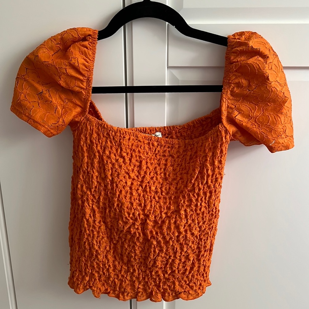 Express puff sleeves, square neck, smocked top